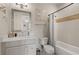 Stylish bathroom with a vanity, decorative mirror, and a shower-tub combination at 654 Mariposa St, Orlando, FL 32801