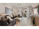 Bright living room featuring stylish furnishings, elegant decor, and a balcony view at 654 Mariposa St, Orlando, FL 32801