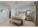 Light and airy main bedroom featuring stylish decor and a walk-in closet at 654 Mariposa St, Orlando, FL 32801