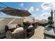 Spacious rooftop patio with plush seating, dining area, bar, and grill perfect for outdoor entertaining at 654 Mariposa St, Orlando, FL 32801
