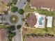 Overhead view of the complex featuring a community pool and sand volleyball court at 724 Terrace Ridge Cir # 724, Davenport, FL 33896