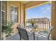 Relaxing balcony area offers a serene outdoor space with neighborhood views at 724 Terrace Ridge Cir # 724, Davenport, FL 33896