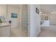 Bathroom offers dual sinks, a large mirror, and a shower-tub combination at 724 Terrace Ridge Cir # 724, Davenport, FL 33896