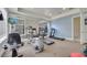 Well-equipped gym featuring cardio machines and strength-training equipment at 724 Terrace Ridge Cir # 724, Davenport, FL 33896