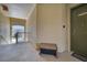 Hallway showcasing the unit's front door and a view of the neighborhood pool at 724 Terrace Ridge Cir # 724, Davenport, FL 33896
