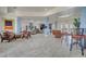 Spacious lobby with stylish seating areas, neutral tones, and plenty of natural light at 724 Terrace Ridge Cir # 724, Davenport, FL 33896