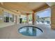 Inviting hot tub area with relaxing community pool and comfortable lounge chairs at 724 Terrace Ridge Cir # 724, Davenport, FL 33896