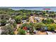 Property aerial view showing the proximity to Lake Eustis and the quiet residential neighborhood with mature trees at 819 Edgewater Dr, Eustis, FL 32726