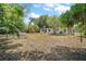Spacious backyard with potential for gardening and recreational activities at 819 Edgewater Dr, Eustis, FL 32726