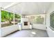 Covered patio featuring a grill and an open backyard view at 819 Edgewater Dr, Eustis, FL 32726