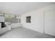 A covered patio, featuring a built in counter with a grill at 819 Edgewater Dr, Eustis, FL 32726