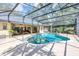 This stunning pool is fully screened in and has lush landscaping and a large screened patio at 1039 Whispering Cv, Casselberry, FL 32707