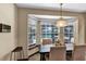 Bright breakfast nook with bay windows offer pool views at 1039 Whispering Cv, Casselberry, FL 32707