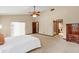 Spacious main bedroom with carpet, vaulted ceiling, and natural lighting at 1039 Whispering Cv, Casselberry, FL 32707