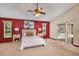 Bright main bedroom with vaulted ceiling, carpet, and sliding door access to the pool at 1039 Whispering Cv, Casselberry, FL 32707