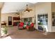 This spacious outdoor patio features ceiling fans, comfortable seating, wet bar, and great natural light at 1039 Whispering Cv, Casselberry, FL 32707