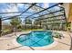 This stunning pool is fully screened in and has unique turtle floats and manicured landscaping at 1039 Whispering Cv, Casselberry, FL 32707