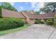 Charming home featuring a two-car garage and a well-manicured front yard at 1107 Monroe Ave, St Cloud, FL 34769