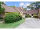 Charming home with a well-manicured lawn, driveway, and a cozy front entrance at 1107 Monroe Ave, St Cloud, FL 34769