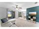Spacious living area with multiple windows and an adjacent dining area at 1107 Monroe Ave, St Cloud, FL 34769