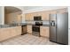 Well-equipped kitchen with stainless steel appliances, granite countertops, and ample cabinet space at 111 Spring Ridge Dr, Debary, FL 32713