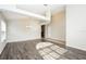Spacious living room boasts modern hard wood floors, neutral walls, and plenty of natural light at 111 Spring Ridge Dr, Debary, FL 32713