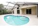 The beautiful screened-in pool has built-in stairs and a refreshing, clean look at 111 Spring Ridge Dr, Debary, FL 32713