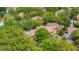 Scenic aerial view of the condo complex surrounded by lush trees at 1111 Salerno Ct # Ge, Orlando, FL 32806