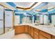 Spacious bathroom featuring double sinks, ample counter space, and a separate shower and tub area at 1111 Salerno Ct # Ge, Orlando, FL 32806