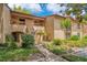 Well-maintained condo exterior with lush landscaping, private patios and walkways at 1111 Salerno Ct # Ge, Orlando, FL 32806