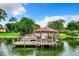 Lakeside gazebo with dock access for boaters, a great location to access the lake and relax in the shade at 1111 Salerno Ct # Ge, Orlando, FL 32806
