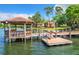 Lakeside gazebo with boat dock access, a prime place for boaters to store their boats and relax by the lake at 1111 Salerno Ct # Ge, Orlando, FL 32806