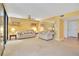 Bright living room featuring neutral carpet, fan, yellow wall and sliding glass doors at 1111 Salerno Ct # Ge, Orlando, FL 32806