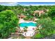 Community pool with gazebo, waterfall, and seating areas, a beautiful outdoor oasis for residents at 1111 Salerno Ct # Ge, Orlando, FL 32806