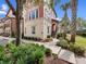 Stunning two-story home with a beautifully landscaped yard and elegant architectural details at 1120 Parma Cir, Lake Mary, FL 32746
