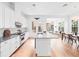 Bright, modern kitchen with stainless steel appliances, a large island, and an open concept design at 1120 Parma Cir, Lake Mary, FL 32746