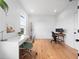 Bright home office with modern decor, two desks, and hardwood floors at 1120 Parma Cir, Lake Mary, FL 32746