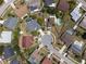 Overhead view of a quiet neighborhood featuring a cul-de-sac and private pools at 11705 Binfield Ct, Orlando, FL 32837