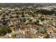 Expansive aerial view of a community close to commercial spaces and green spaces at 11705 Binfield Ct, Orlando, FL 32837
