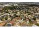 Expansive aerial view of a community close to commercial spaces and green spaces at 11705 Binfield Ct, Orlando, FL 32837