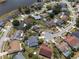 Community aerial view showcasing homes with pools and neatly landscaped yards at 11705 Binfield Ct, Orlando, FL 32837