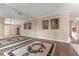 Light filled bonus room featuring hardwood floors, and mirrored wall at 11705 Binfield Ct, Orlando, FL 32837