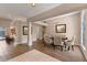 Formal dining room with wood floors, chandelier, and elegant furnishings perfect for entertaining at 11705 Binfield Ct, Orlando, FL 32837