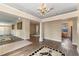 Bright living room featuring wood floors, an open floor plan, and view to the kitchen at 11705 Binfield Ct, Orlando, FL 32837