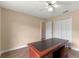 Office with built-in bookcase and large desk at 11705 Binfield Ct, Orlando, FL 32837