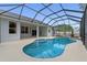 Inviting pool area featuring a screened-in enclosure, tiled pool, and ample space for entertaining at 11705 Binfield Ct, Orlando, FL 32837