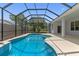 Inviting screened-in pool with attached spa, perfect for outdoor entertaining and relaxation in a private setting at 11705 Binfield Ct, Orlando, FL 32837