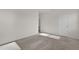 Bright bedroom featuring neutral walls and soft carpeting at 1341 Wycliffe Way, St Cloud, FL 34771