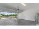 Spacious two-car garage offering ample parking and storage space, with an open door at 1341 Wycliffe Way, St Cloud, FL 34771