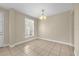 Bright dining area with tiled floors and a view from the window at 14517 Black Lake Preserve St, Winter Garden, FL 34787
